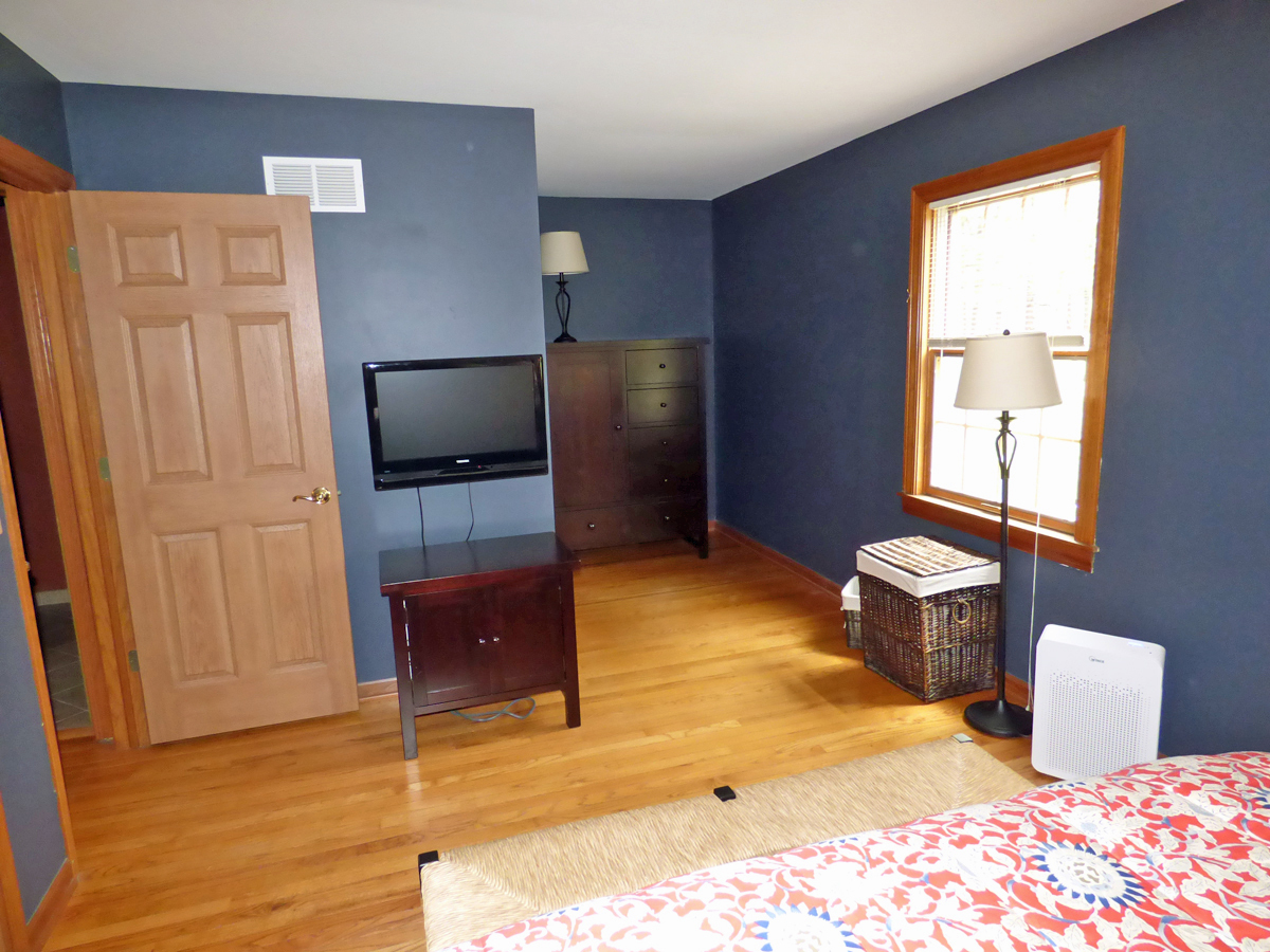 41W121 Whitney Road St. Charles, IL 60175 - Photo 15 of 35 a living room with furniture and a flat screen tv