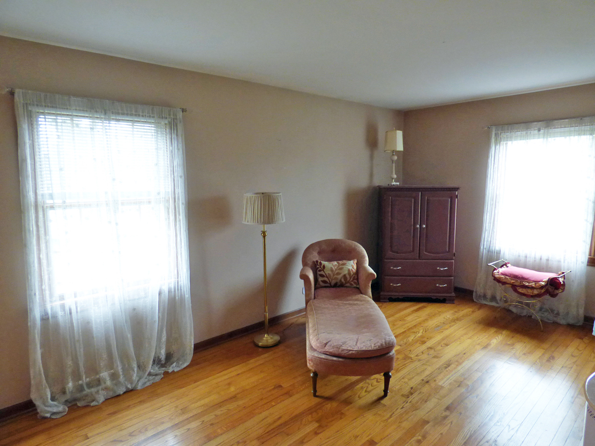 41W121 Whitney Road St. Charles, IL 60175 - Photo 17 of 35 a room with wooden floor and chair
