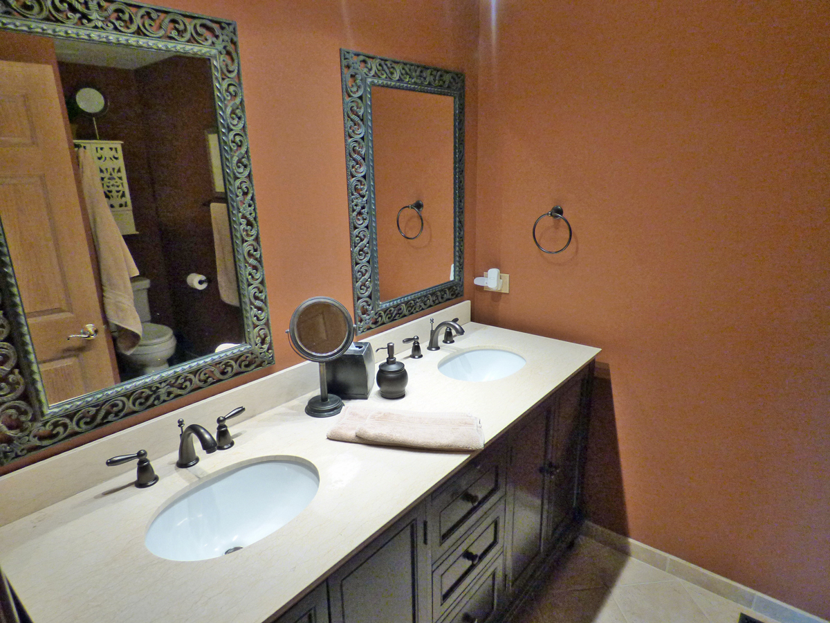 41W121 Whitney Road St. Charles, IL 60175 - Photo 18 of 35 a bathroom with double vanity sinks and a mirror