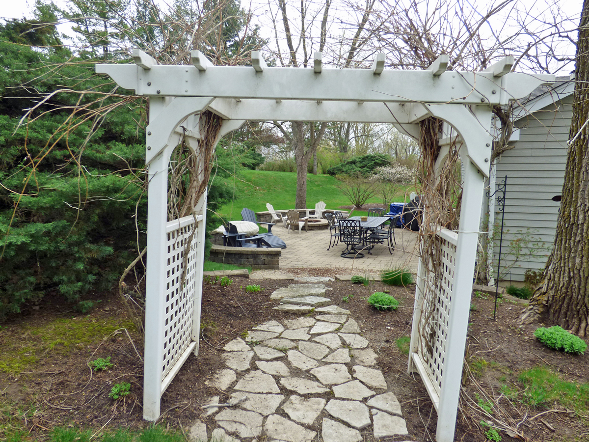 41W121 Whitney Road St. Charles, IL 60175 - Photo 27 of 35 a view of an chair and table in backyard of the house