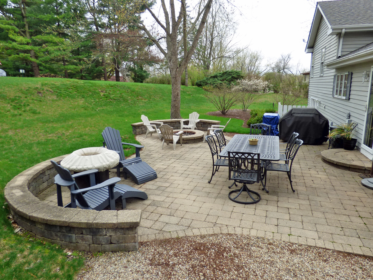 41W121 Whitney Road St. Charles, IL 60175 - Photo 28 of 35 a view of a chairs and table in backyard of the house