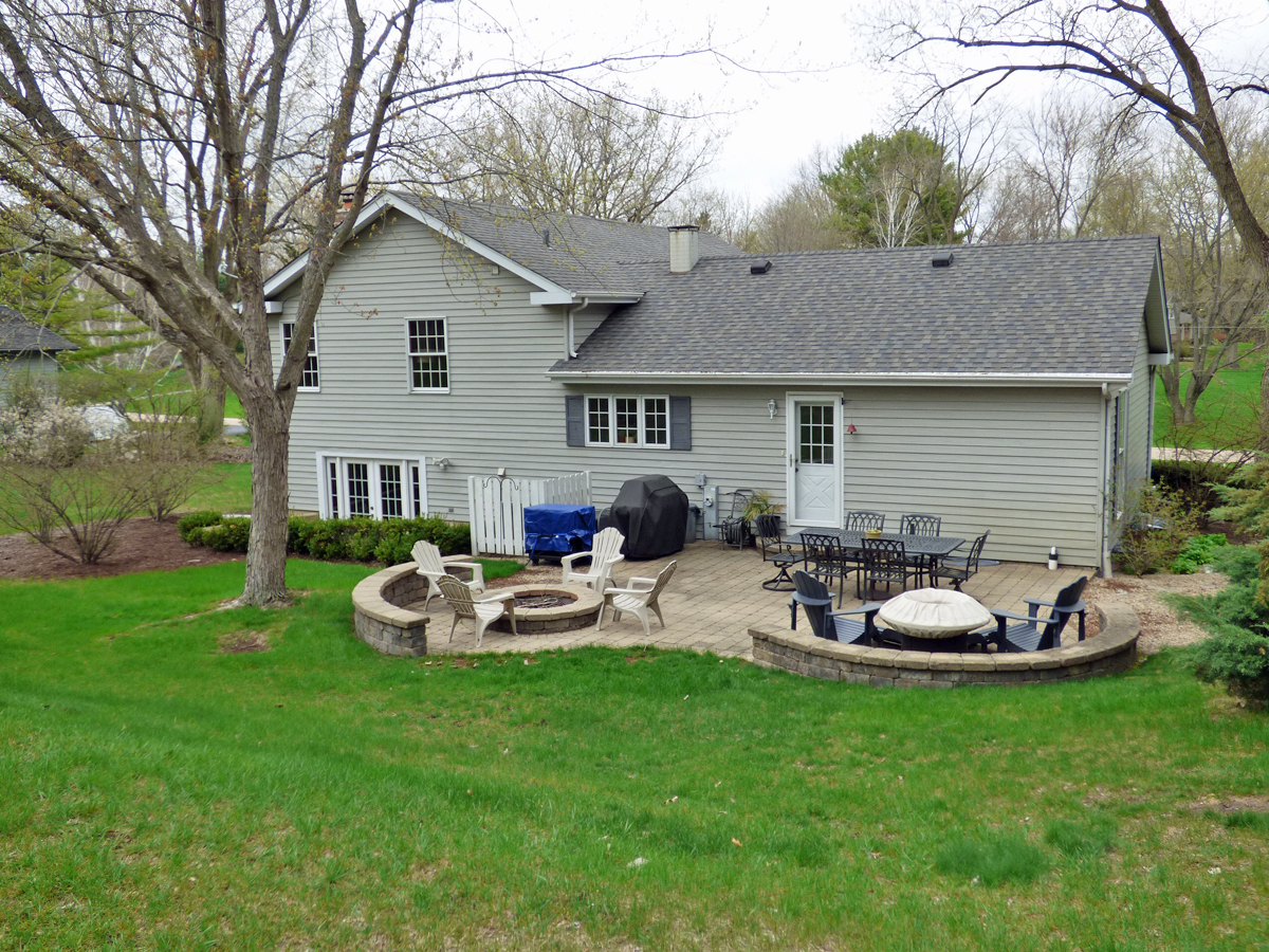 41W121 Whitney Road St. Charles, IL 60175 - Photo 33 of 35 a front view of house with yard and outdoor seating