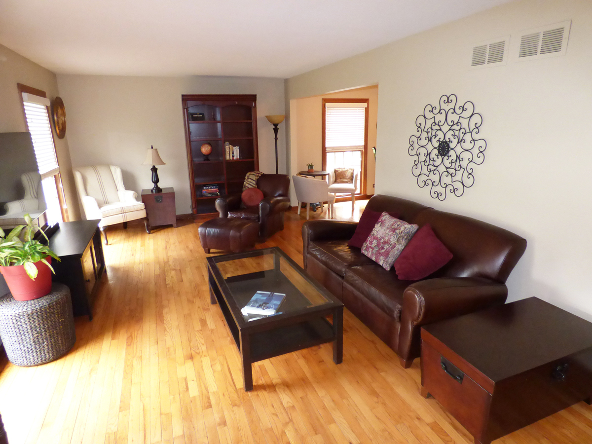 41W121 Whitney Road St. Charles, IL 60175 - Photo 5 of 35 a living room with furniture and a fireplace