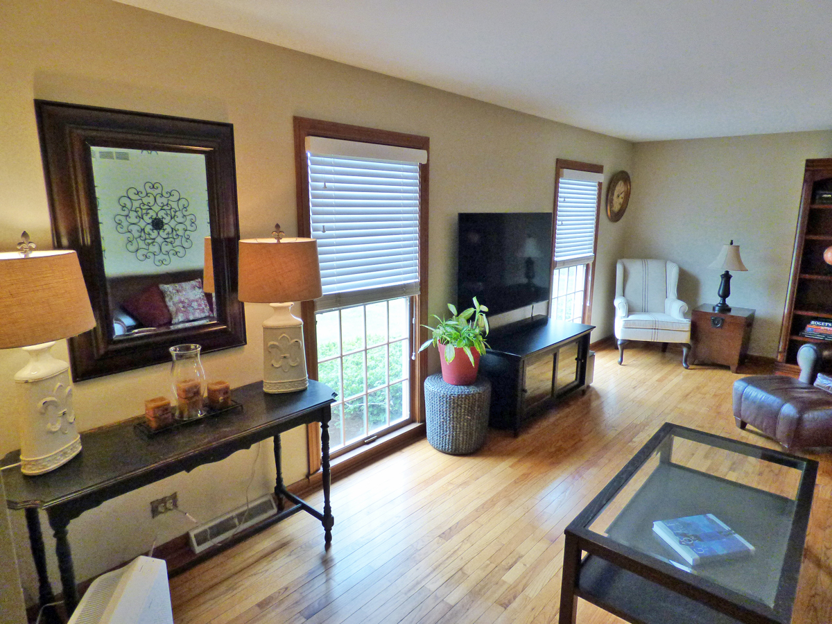 41W121 Whitney Road St. Charles, IL 60175 - Photo 6 of 35 a living room with furniture and a flat screen tv
