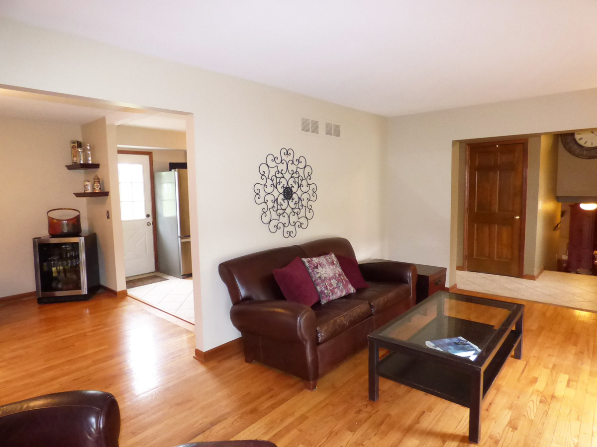 41W121 Whitney Road St. Charles, IL 60175 - Photo 7 of 35 a living room with furniture and a wooden floor