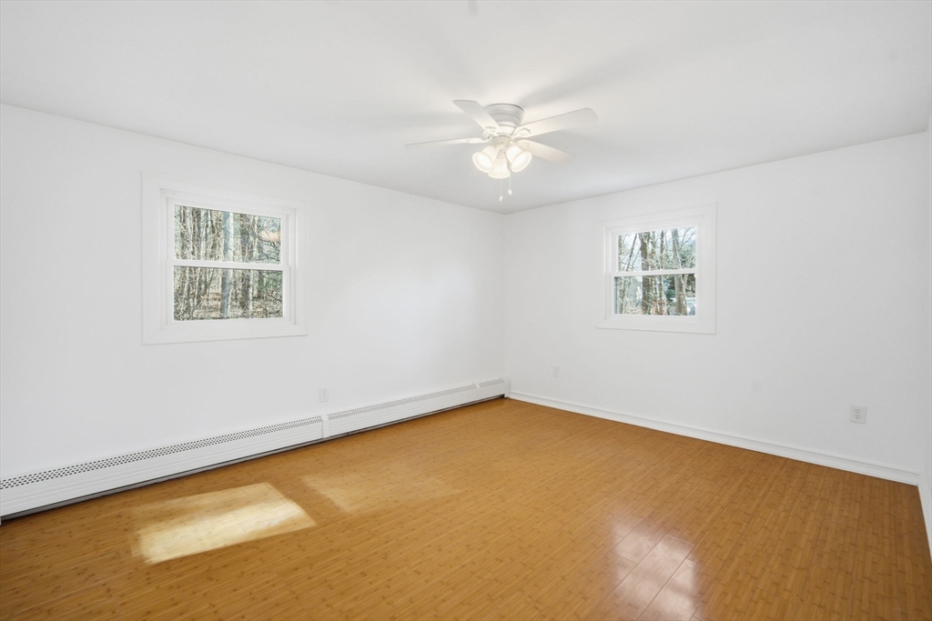 7 Fuller Road Sutton, MA 01590 - Photo 18 of 29 a view of an empty room with a window