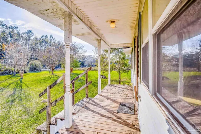 a view of a swimming pool with an outdoor space
