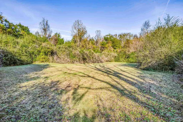 a kitchen with a sink stove and refrigerator