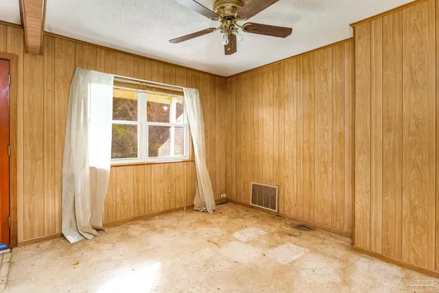 a bathroom with a toilet a sink and a shower