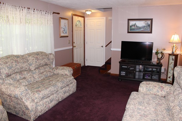 147 S Road Templeton, MA 01468 - Photo 11 of 21 a living room with furniture and a flat screen tv