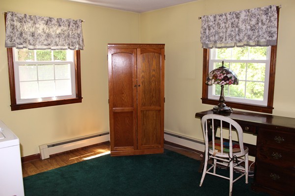147 S Road Templeton, MA 01468 - Photo 13 of 21 a view of a room with a window and a chandelier