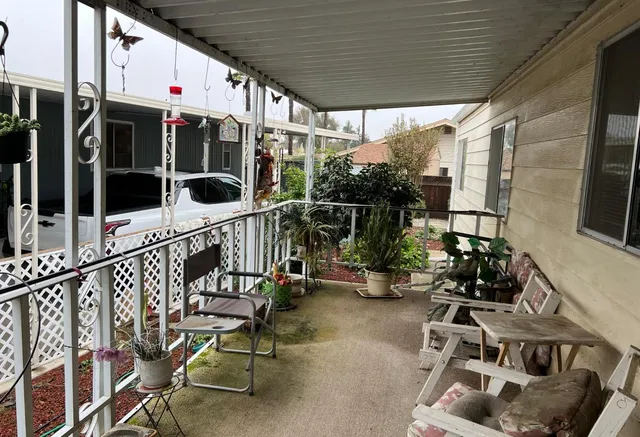 a view of yard with patio