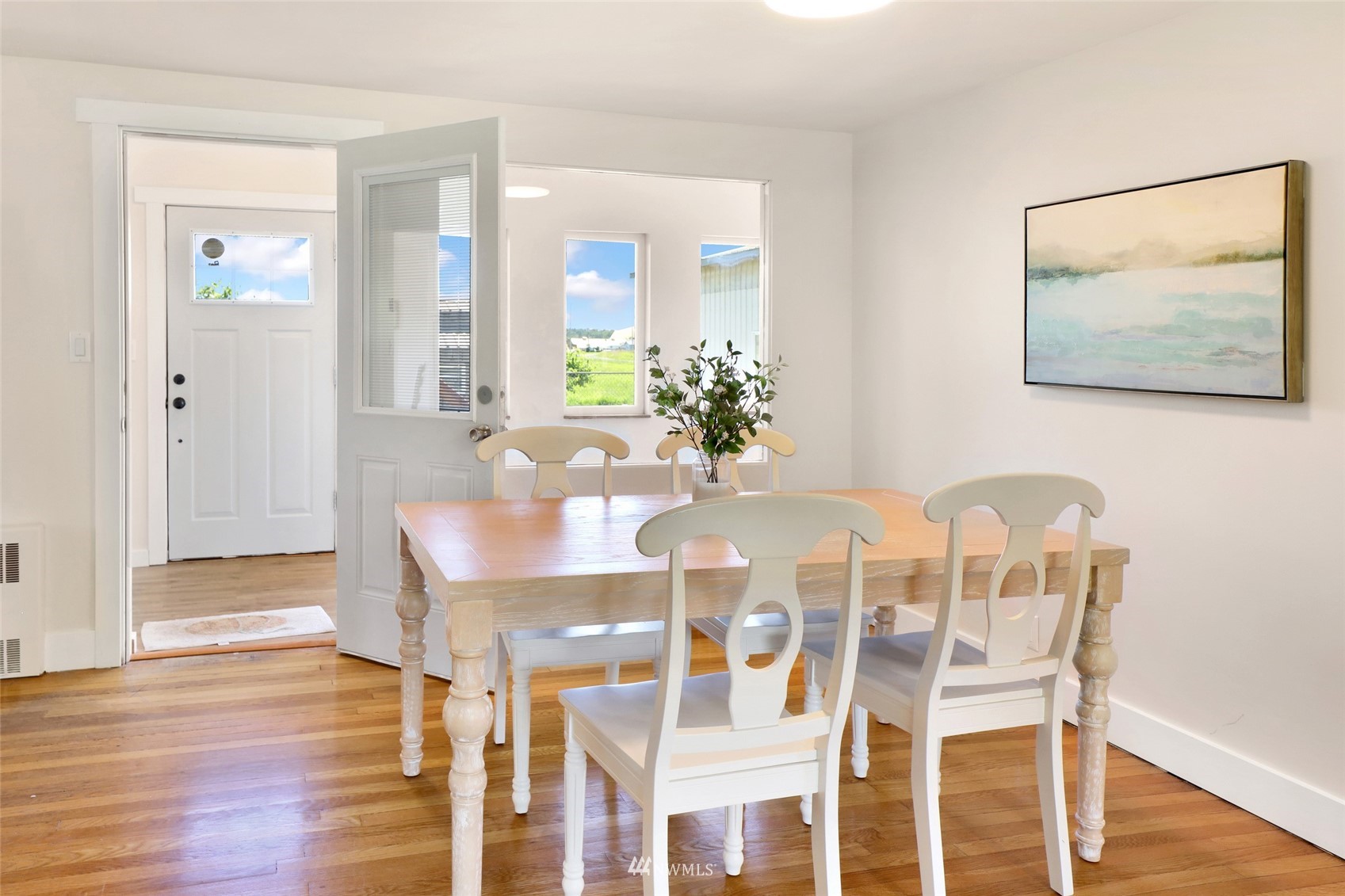 2397 Slater Road Ferndale, WA 98248 - Photo 14 of 40 a view of a dining room with furniture and wooden floor