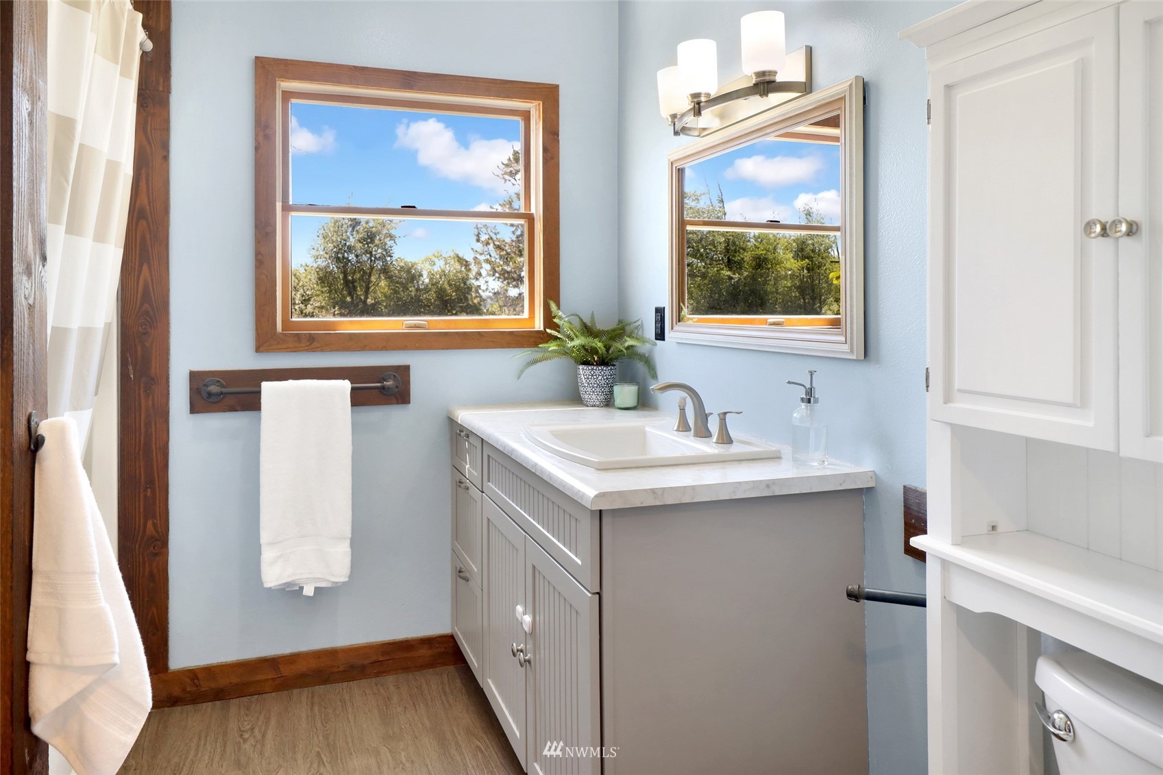 2397 Slater Road Ferndale, WA 98248 - Photo 8 of 40 a bathroom with a sink mirror and a window