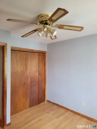 a view of an empty room with windows