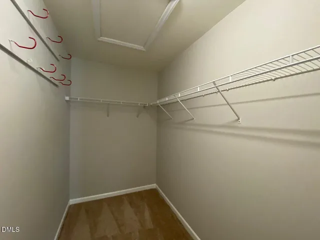a view of a room with racks on the wall