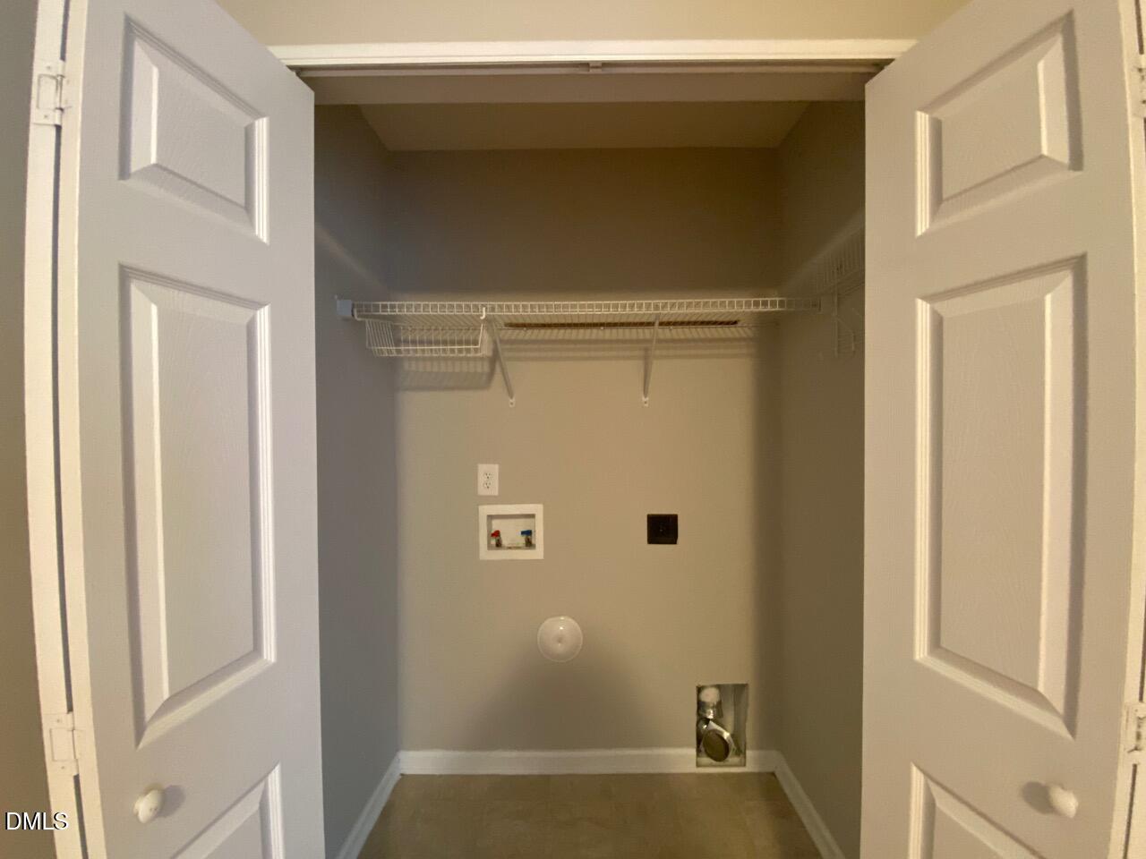 134 Darley Dale Loop Apex, NC 27502 - Photo 5 of 23 a view of door