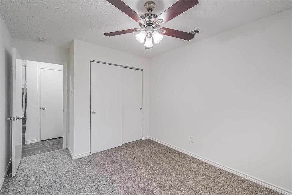6235 West Willow Bluff Road Katy, TX 77449 - Photo 9 of 18 a view of an empty room
