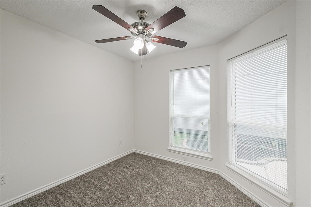 6235 West Willow Bluff Road Katy, TX 77449 - Photo 10 of 18 an empty room with a window