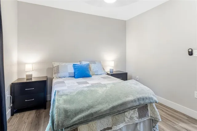 a bedroom with a bed and a closet