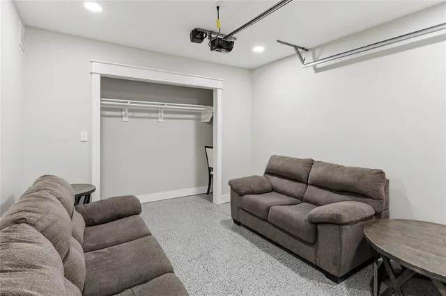 a living room with furniture and a couch