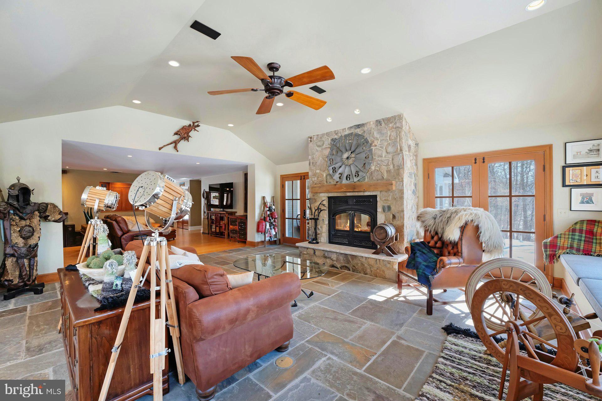 43470 Evans Pond Road Leesburg, VA 20176 - Photo 14 of 114 a living room with furniture a rug and a fireplace