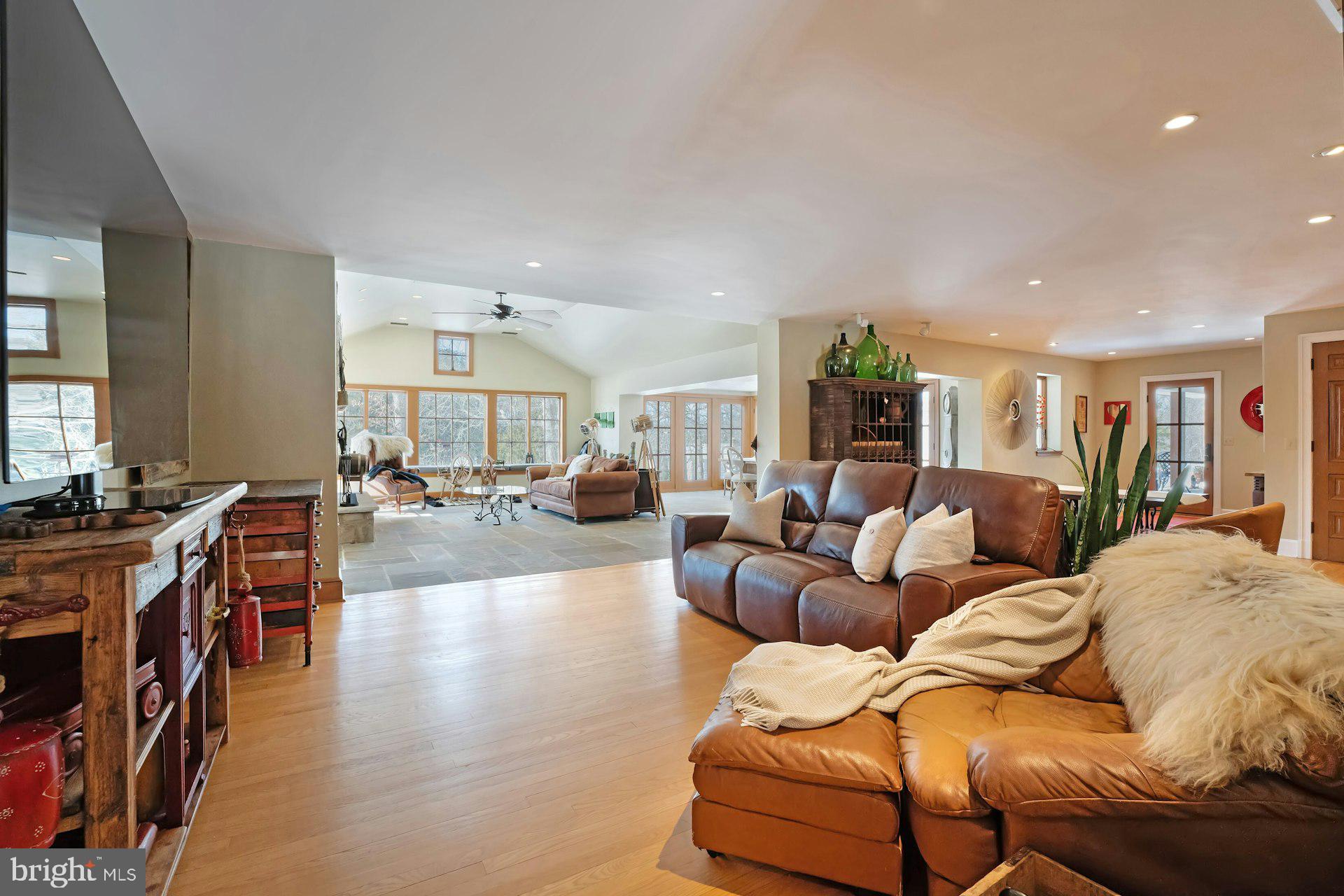 43470 Evans Pond Road Leesburg, VA 20176 - Photo 21 of 114 a living room with furniture and a flat screen tv