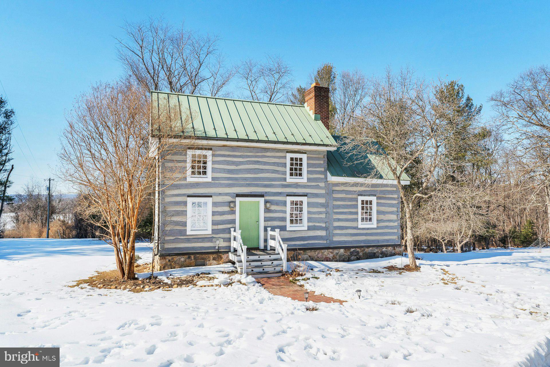 43470 Evans Pond Road Leesburg, VA 20176 - Photo 48 of 114 a view of a house with snow on the road