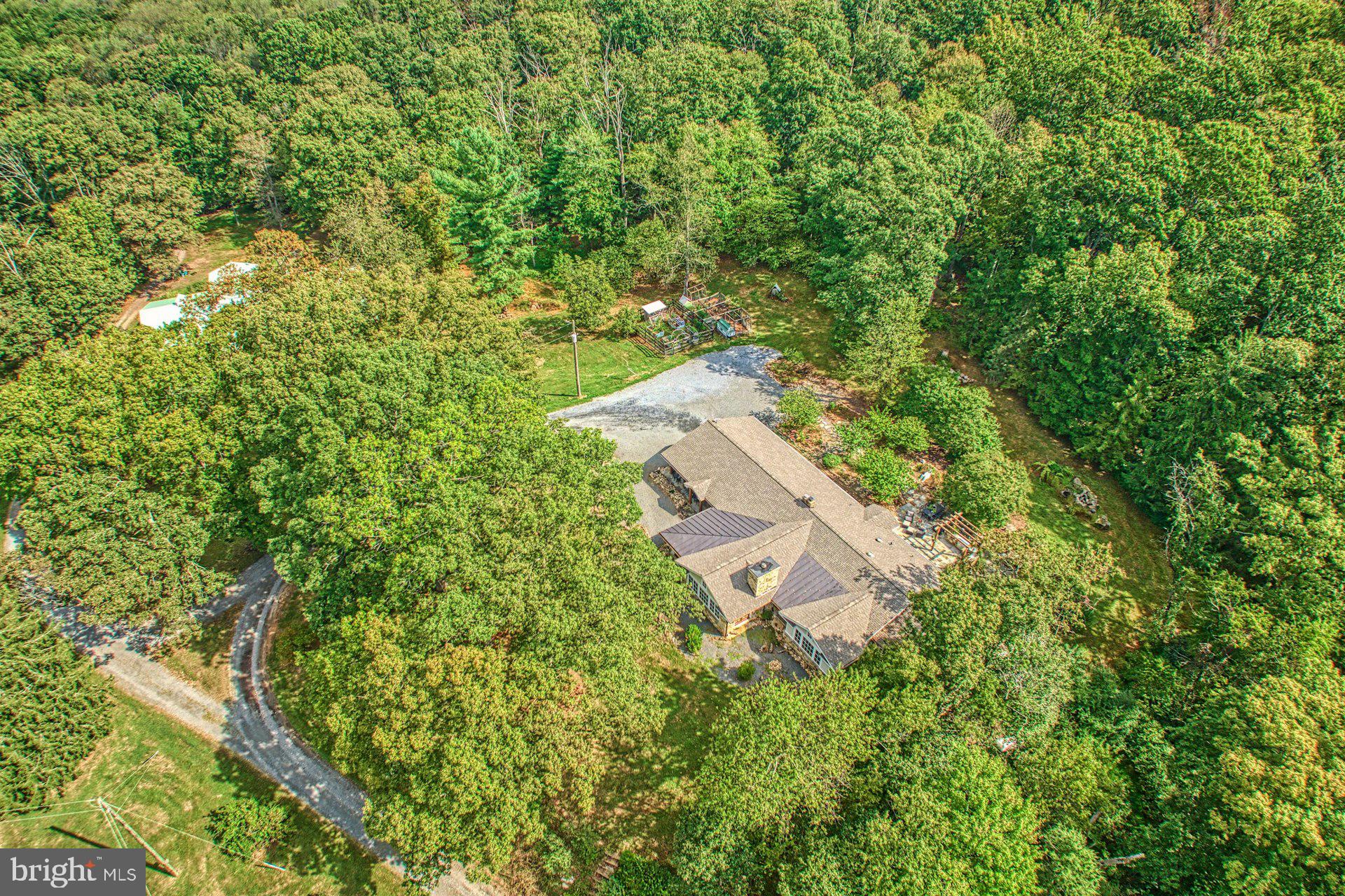 43470 Evans Pond Road Leesburg, VA 20176 - Photo 92 of 114 an aerial view of a house with a yard