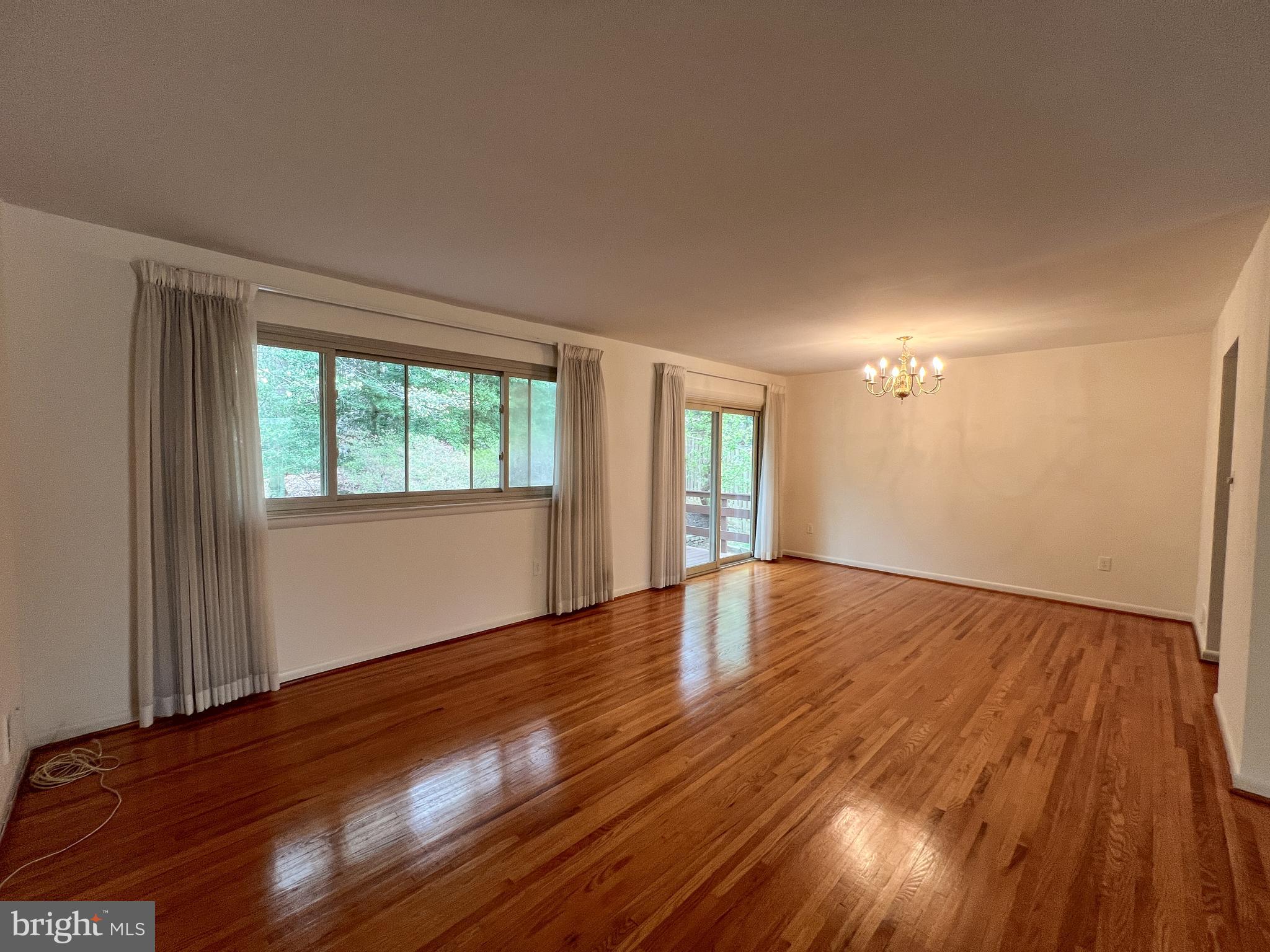 10810 Margate Road Silver Spring, MD 20901 - Photo 14 of 36 Living Room, Dining Room, Sliding Door to Deck