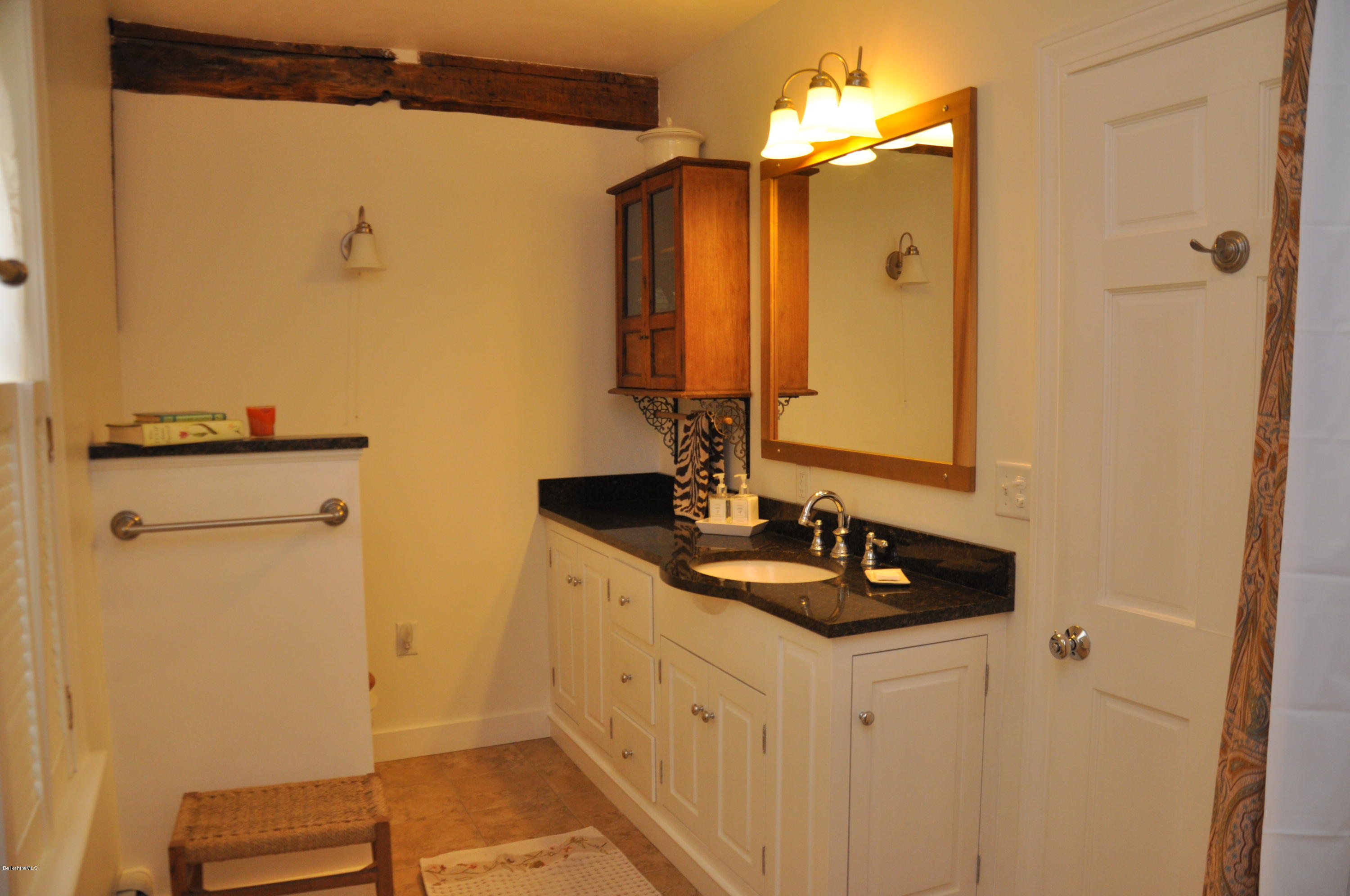 210 Main Road Monterey, MA 01245 - Photo 11 of 33 a bathroom with a sink and a mirror