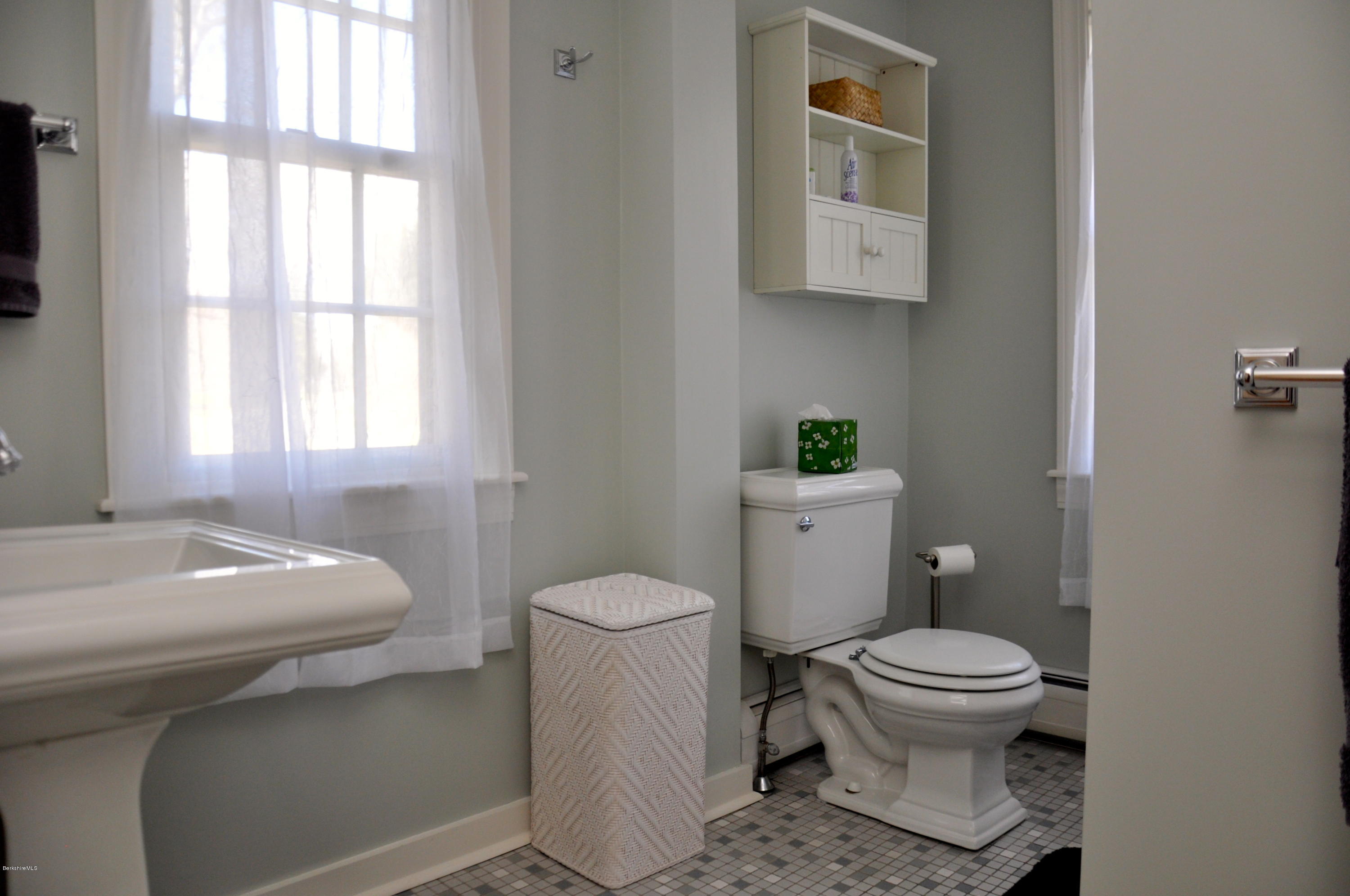 210 Main Road Monterey, MA 01245 - Photo 12 of 33 a bathroom with a sink toilet and window