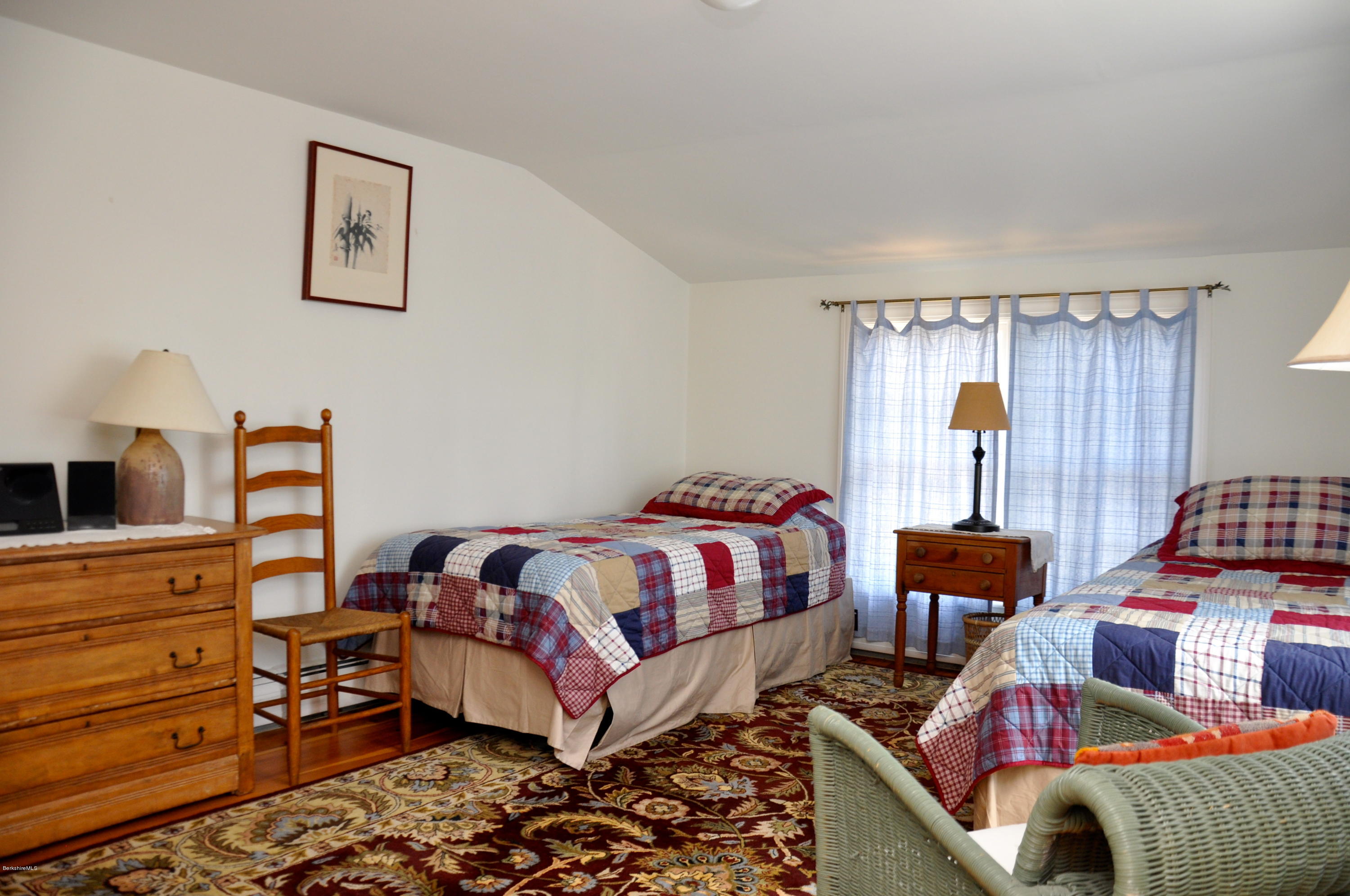 210 Main Road Monterey, MA 01245 - Photo 14 of 33 a bedroom with furniture and a window