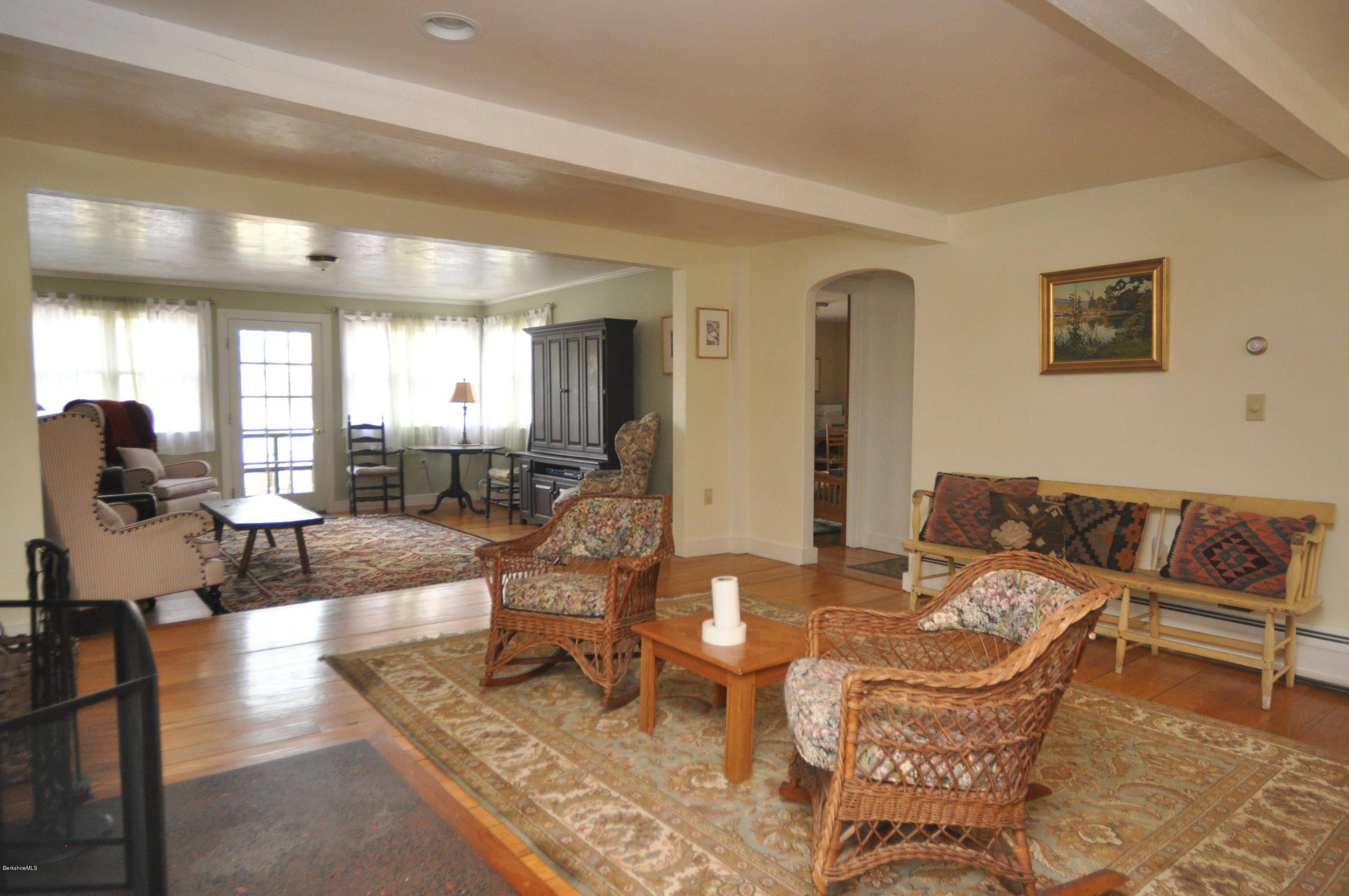 210 Main Road Monterey, MA 01245 - Photo 18 of 33 a living room with furniture kitchen view and a large window