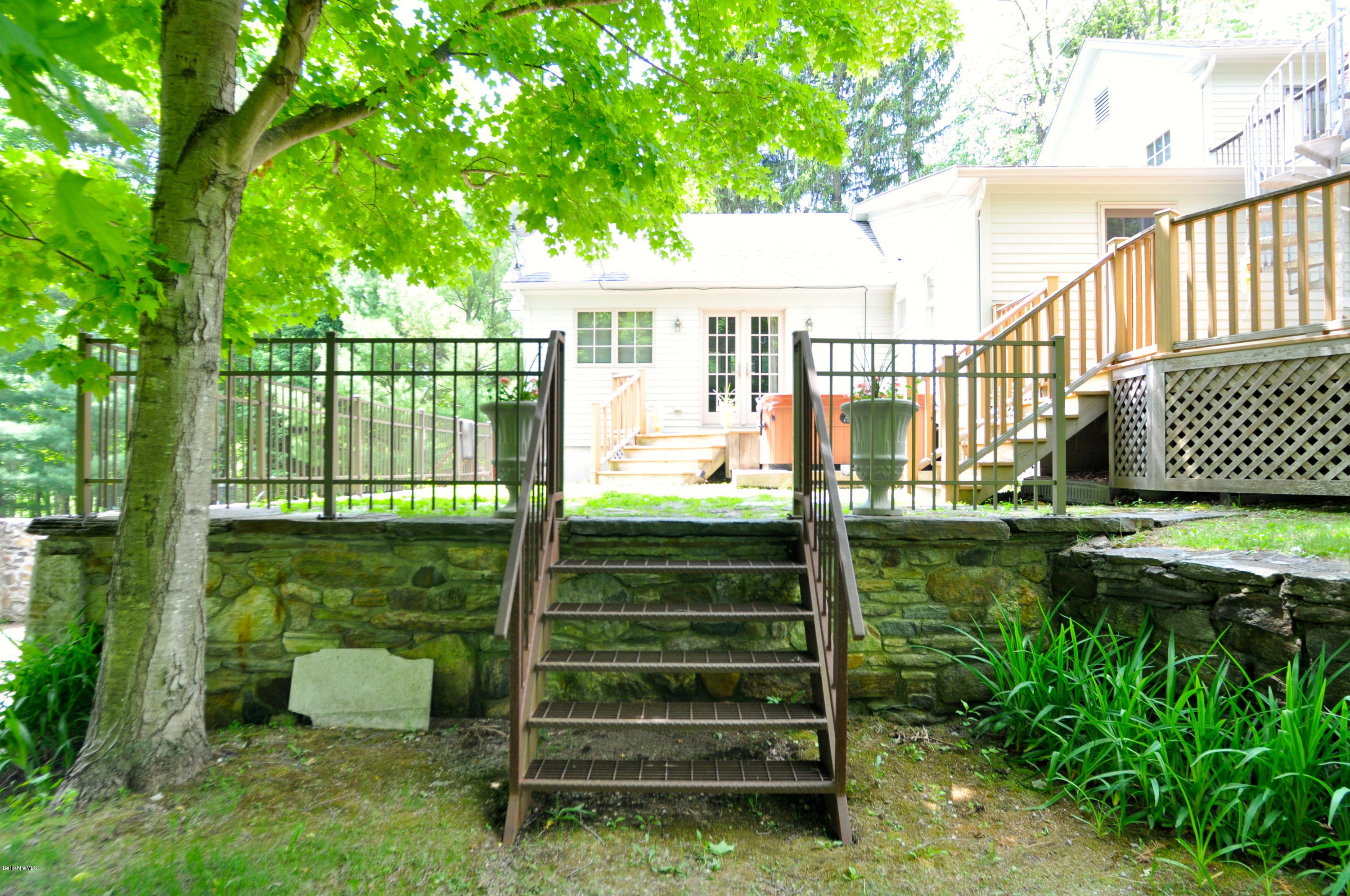 210 Main Road Monterey, MA 01245 - Photo 19 of 33 front view of a house with a yard