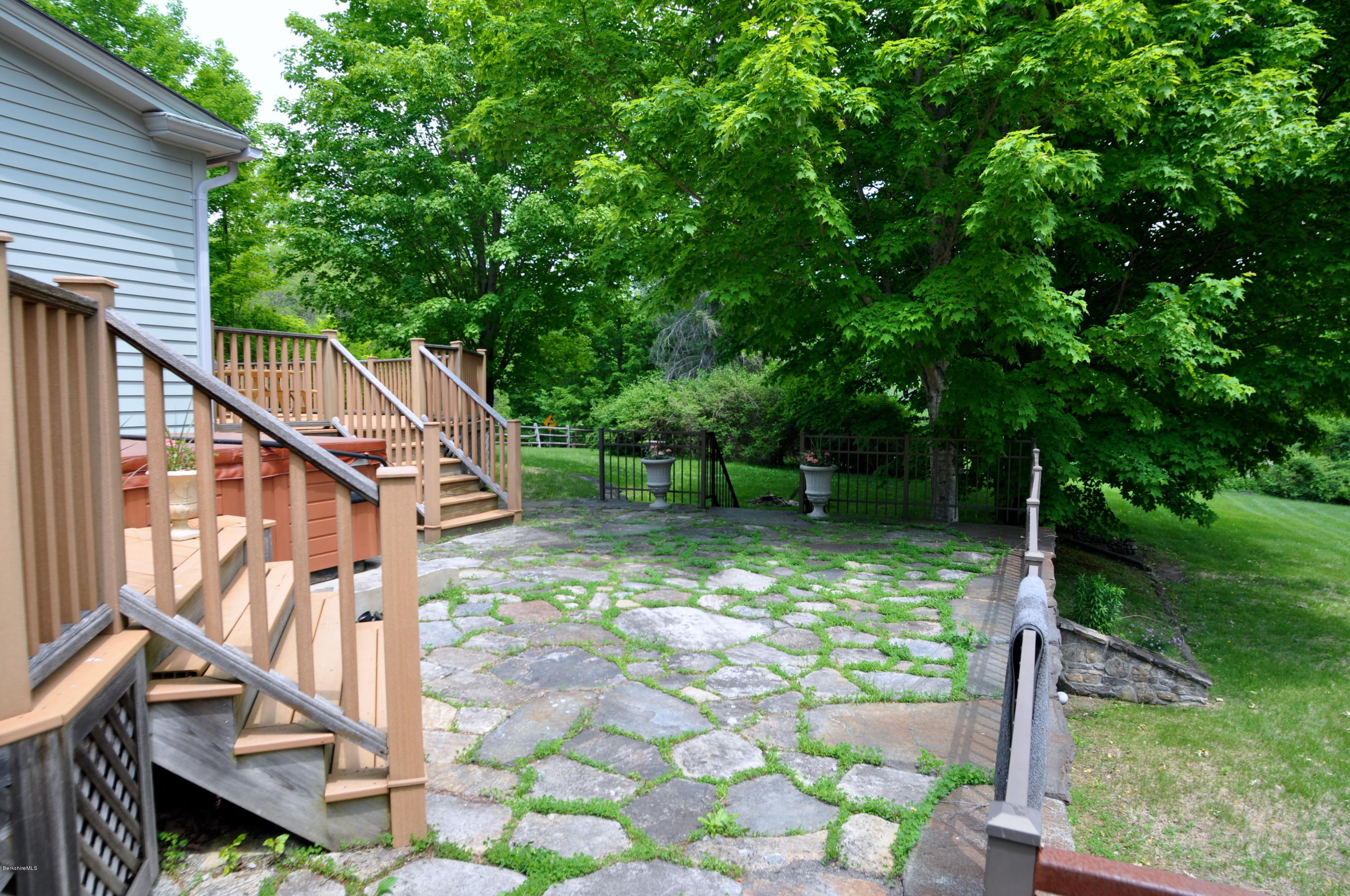 210 Main Road Monterey, MA 01245 - Photo 28 of 33 a backyard of a house with lots of green space