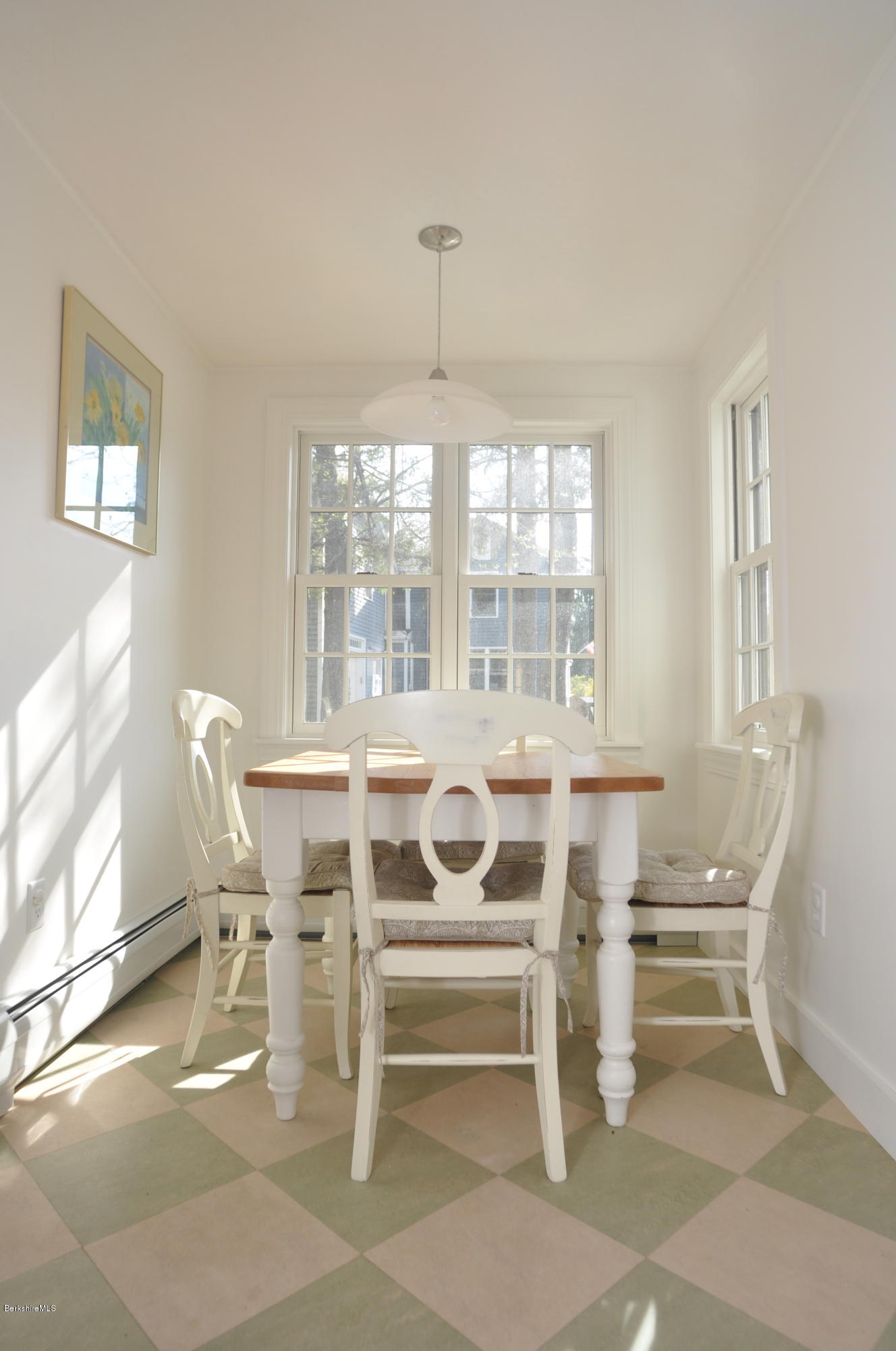 210 Main Road Monterey, MA 01245 - Photo 31 of 33 a view of a dining room with furniture a chandelier and wooden floor