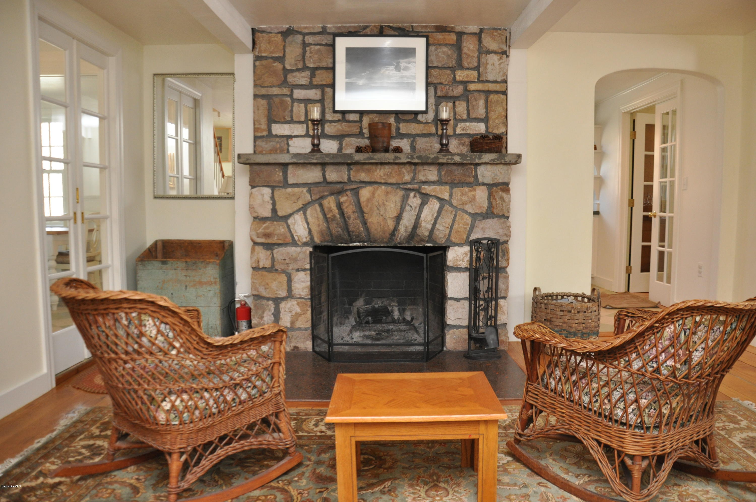210 Main Road Monterey, MA 01245 - Photo 6 of 33 a living room with furniture and a fireplace