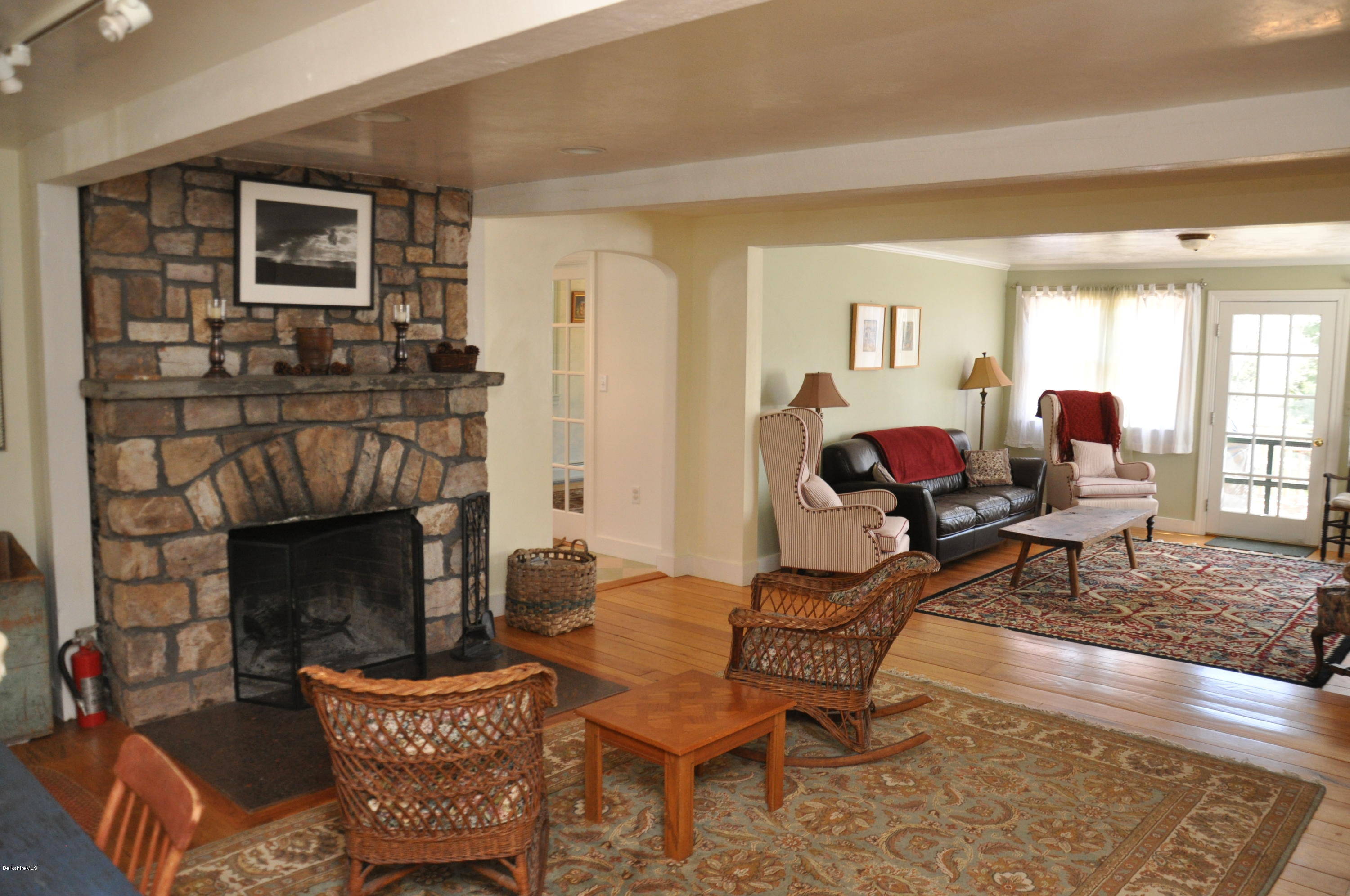 210 Main Road Monterey, MA 01245 - Photo 7 of 33 a living room with furniture fireplace and window