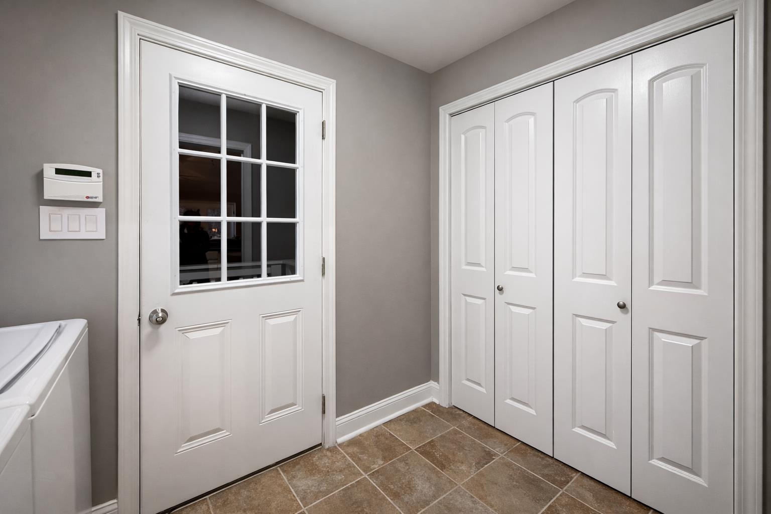 60 Masters Court Counce, TN 38326 - Photo 18 of 30 Laundry room featuring baseboards and dark tile patterned flooring
