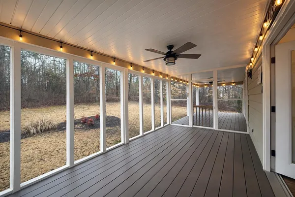 a view of an empty room with stairs