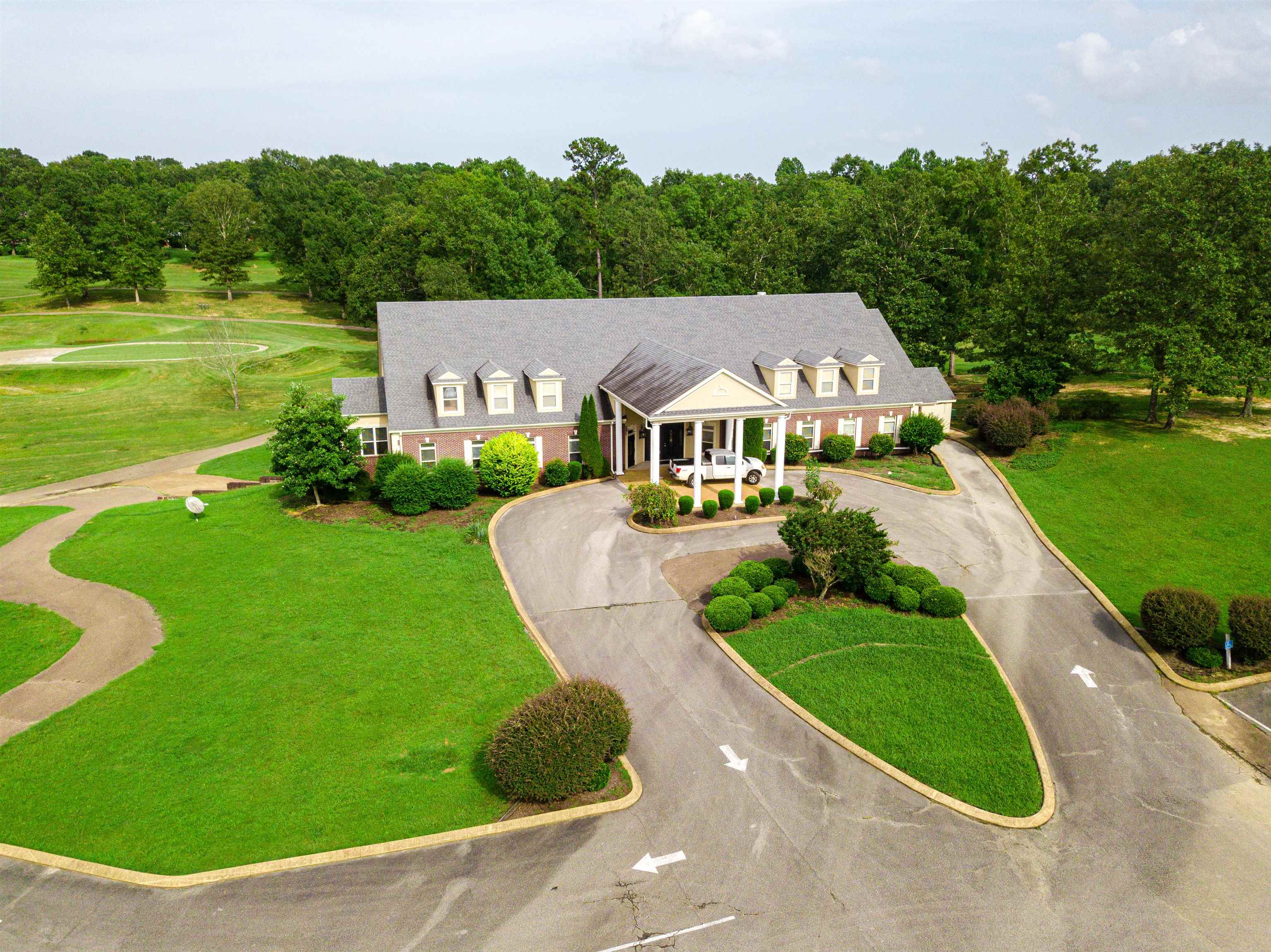60 Masters Court Counce, TN 38326 - Photo 24 of 30 Cape cod-style house with a front yard, a porch, and curved driveway