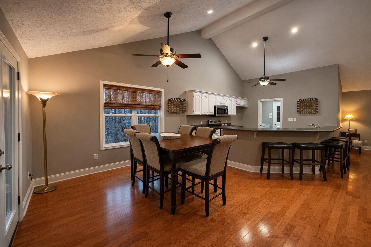 60 Masters Court Counce, TN 38326 - Photo 8 of 30 Dining area with light wood-type flooring, ceiling fan, and vaulted ceiling