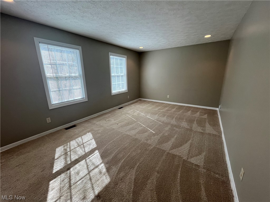2819 Best Road Cambridge, OH 43725 - Photo 7 of 33 Carpeted living room overlooks front yard