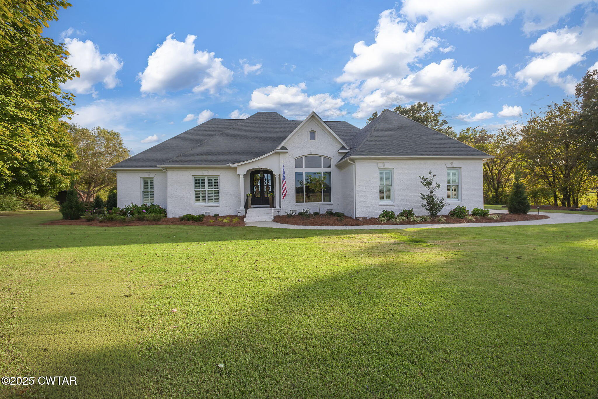 119 Bascom Road Jackson, TN 38305 - Photo 1 of 49 a front view of house with yard and green space