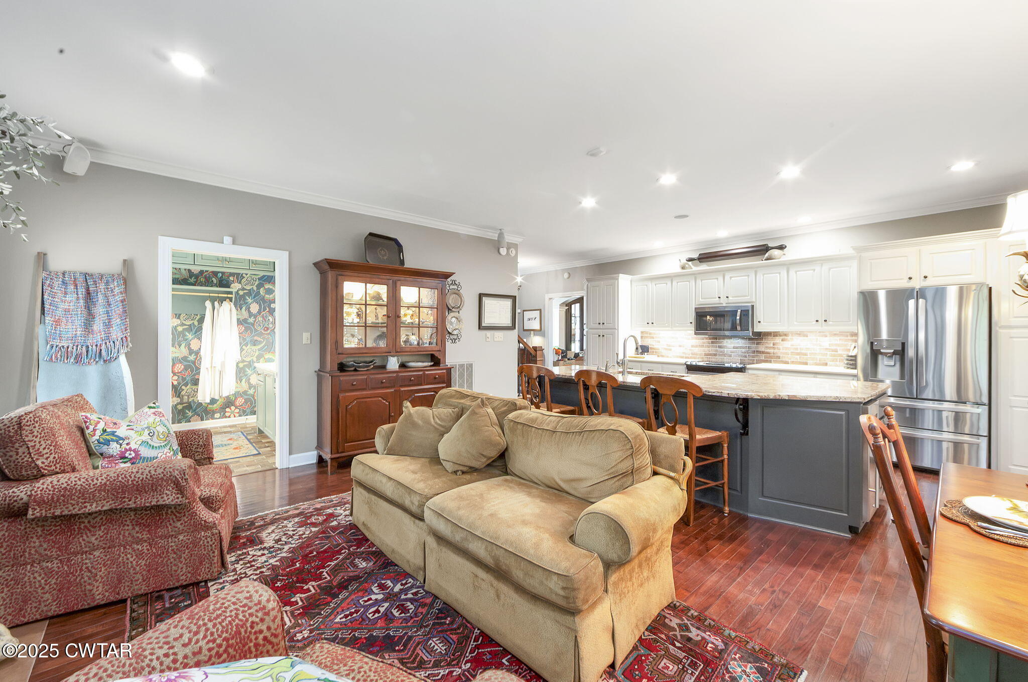 119 Bascom Road Jackson, TN 38305 - Photo 13 of 49 a living room with stainless steel appliances furniture and a kitchen view