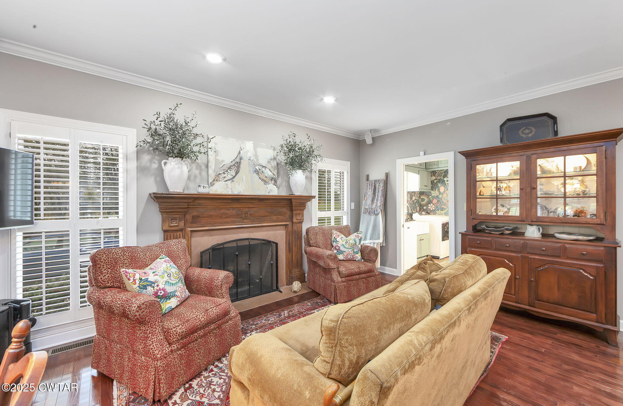 119 Bascom Road Jackson, TN 38305 - Photo 14 of 49 a living room with furniture and a fireplace