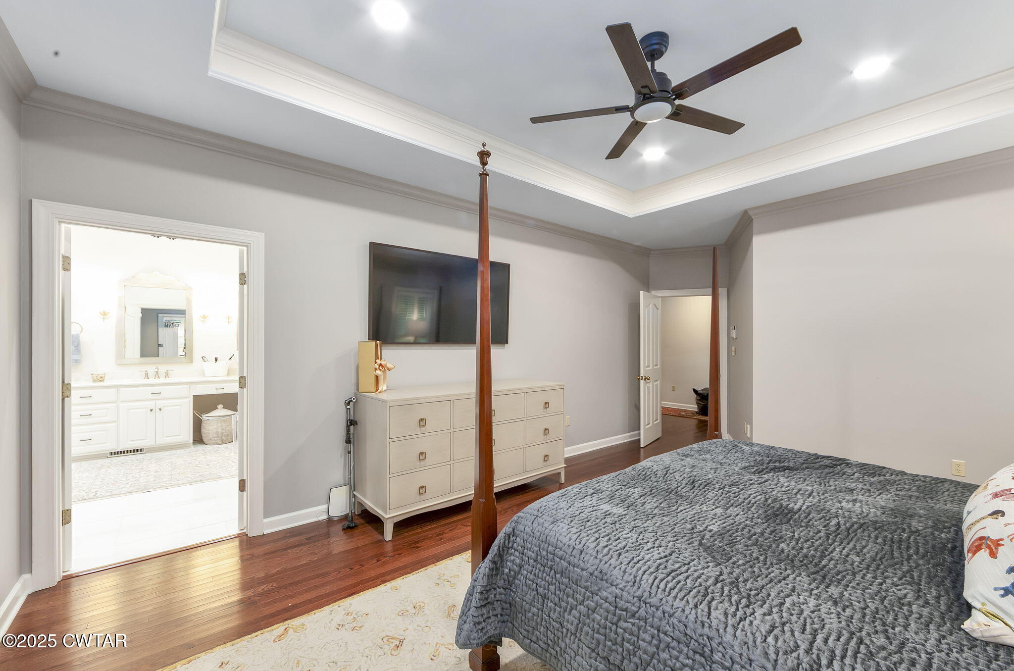 119 Bascom Road Jackson, TN 38305 - Photo 16 of 49 a bedroom with a bed and a flat screen tv