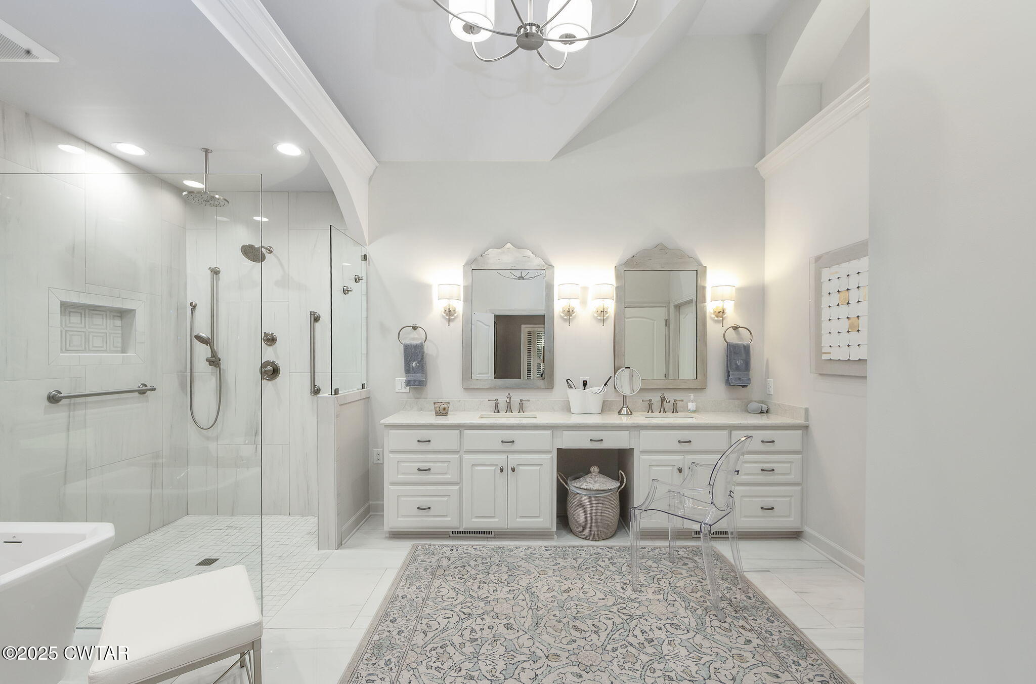 119 Bascom Road Jackson, TN 38305 - Photo 20 of 49 a spacious bathroom with a double vanity sink mirror and bathtub
