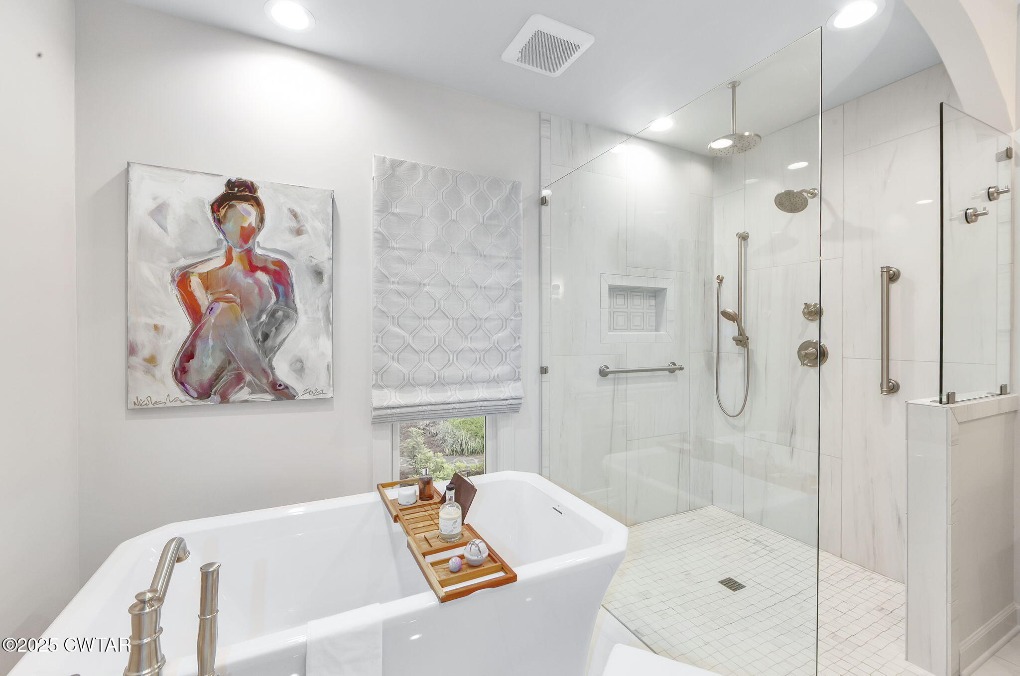 119 Bascom Road Jackson, TN 38305 - Photo 21 of 49 a bathroom with a bath tub a shower and a sink